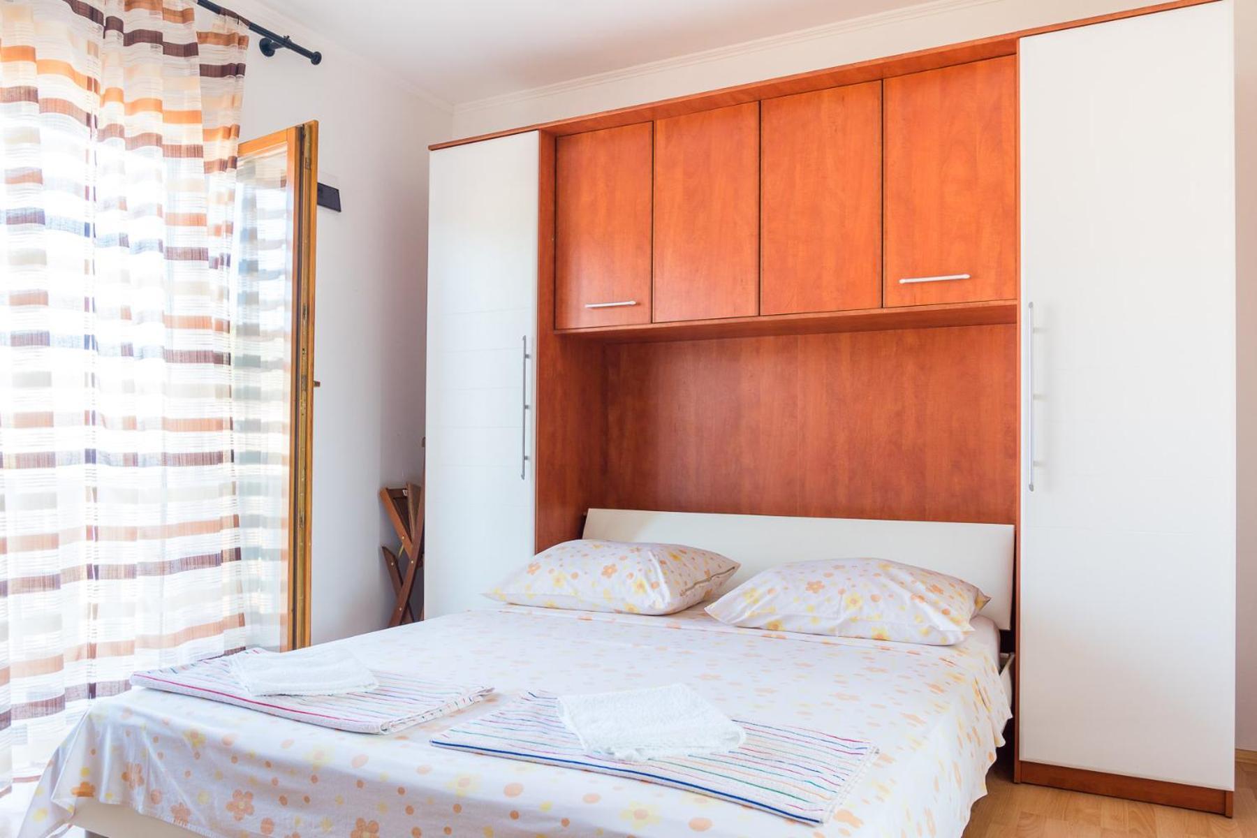 Apartmani Fides Lumbarda Rom bilde