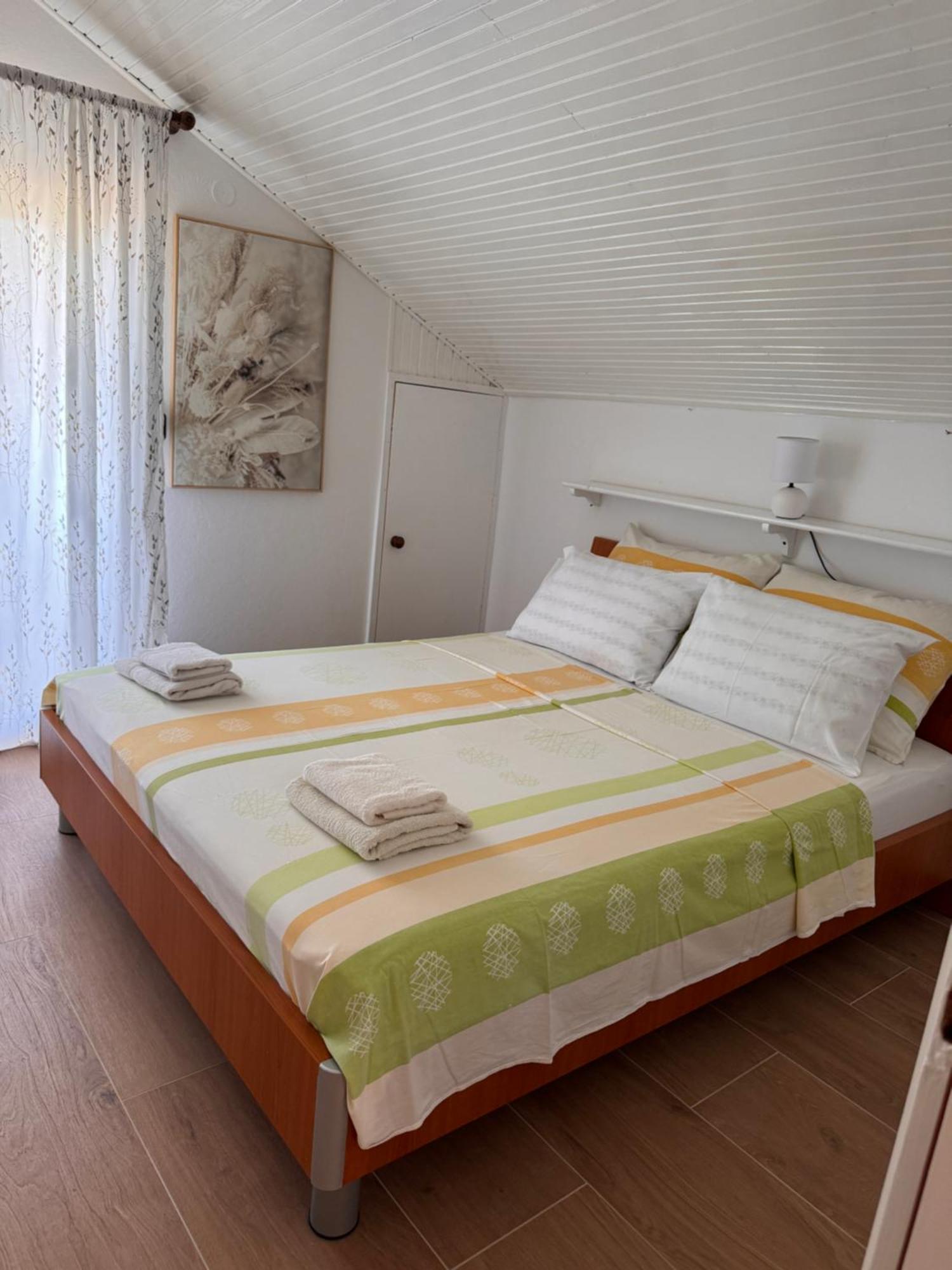 Apartmani Fides Lumbarda Rom bilde